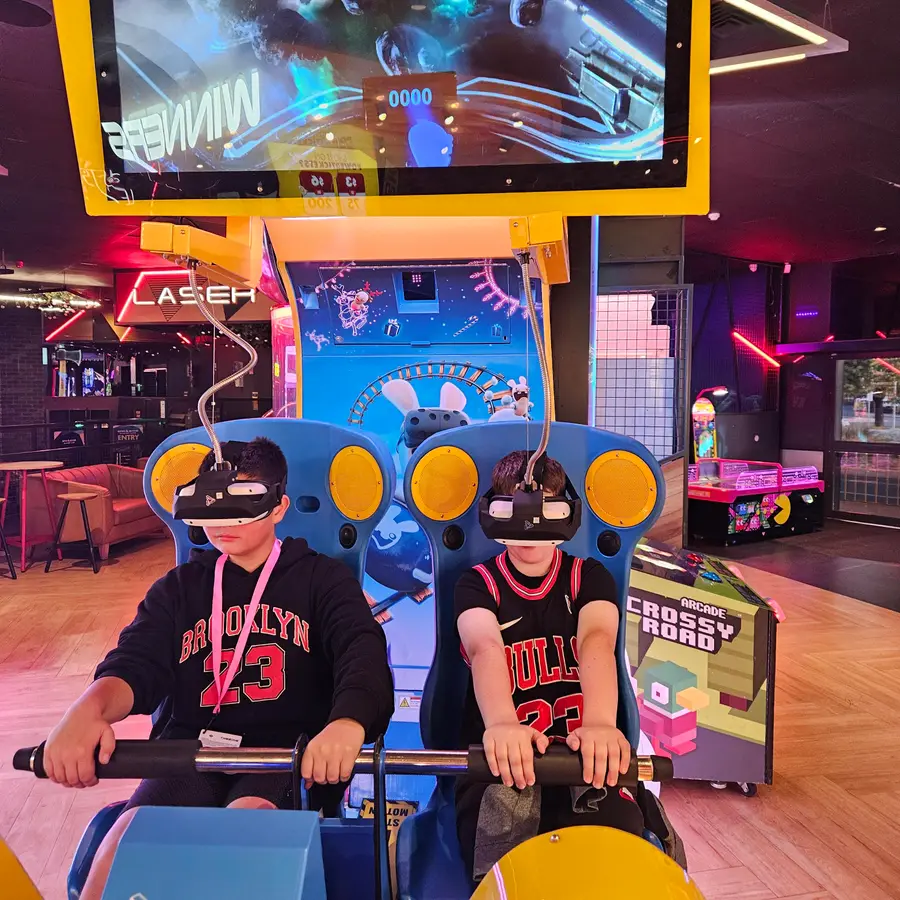 NDIS participants enjoying a social outing at an arcade in South Australia